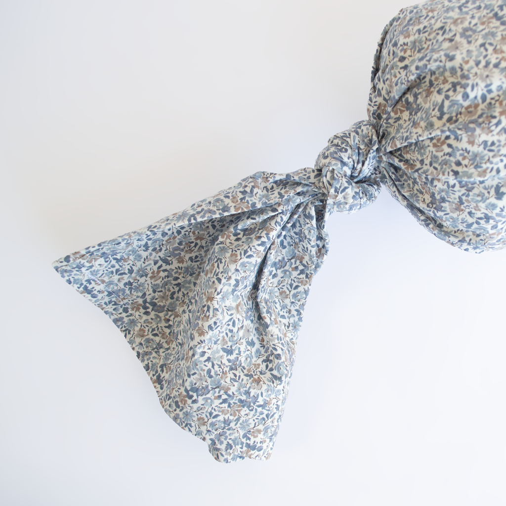 Cojín Cilindro - Flores celestes